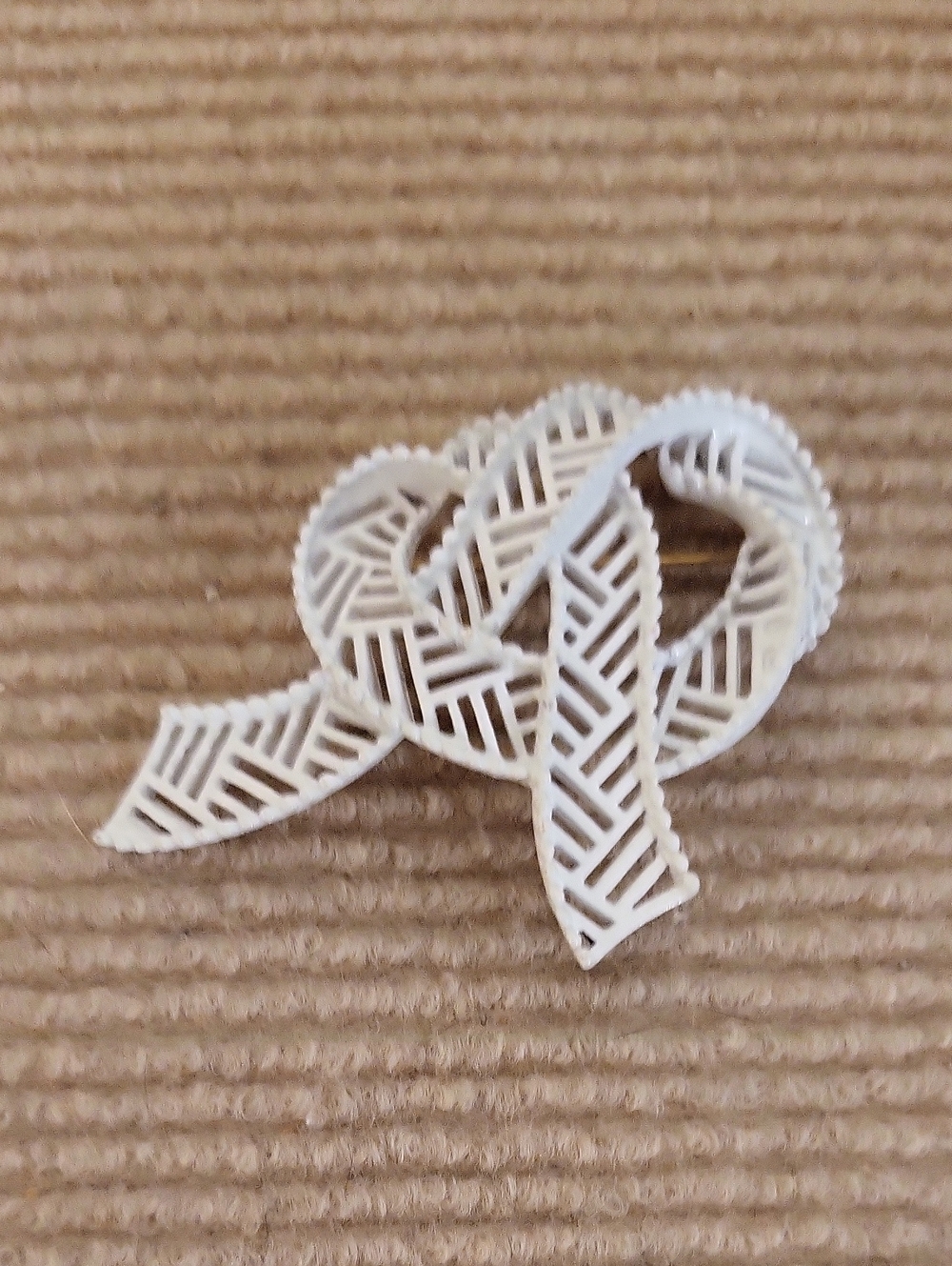 Vintage Crown Trifari brooch / White Enamel Ribbon Knotted Design